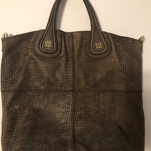 Used Givenchy Nightengale Bag with no strap. Brown